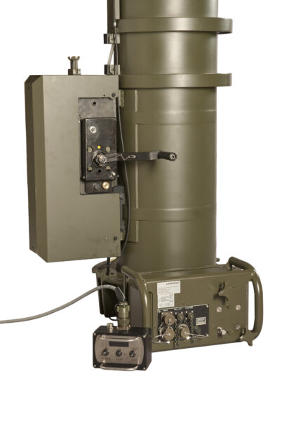 Close-up of the EXB telescopic mast base showing the manual crank handle, integrated drive mechanism and 24 V power control unit with RS485 interface, high/low limit and remote control connectors.